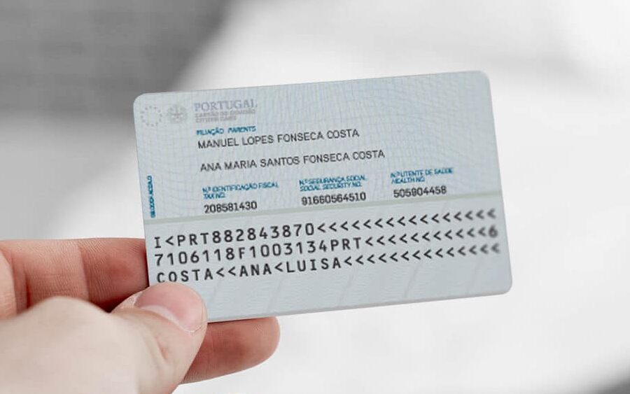 child holding nif card with parents assistance