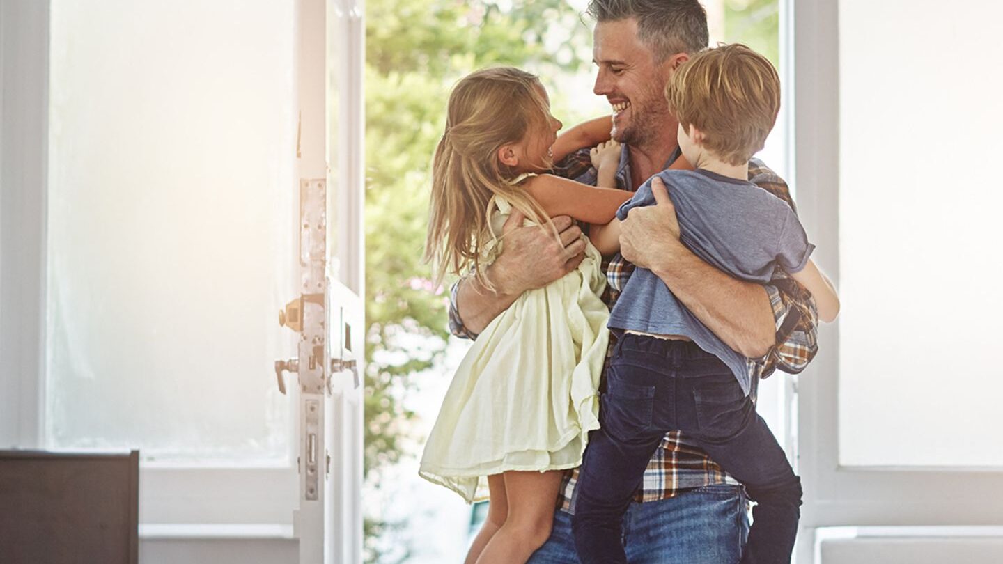 happy parents with child sharing custody