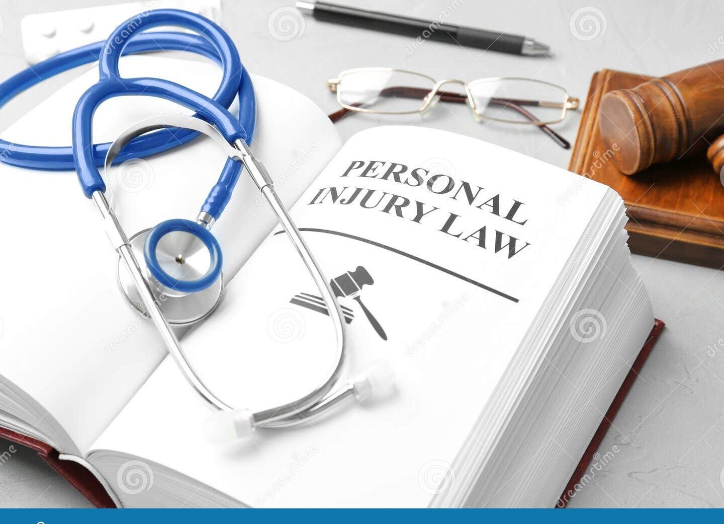law book with stethoscope and x ray image