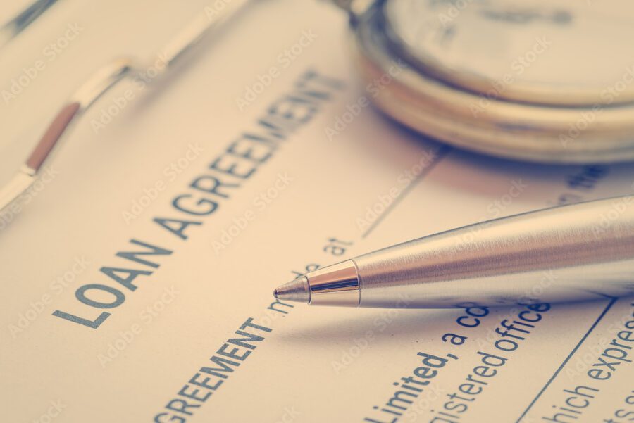 legal documents and a clock