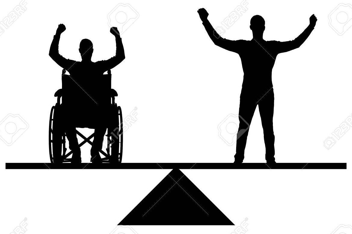 person holding a disability rights symbol sign