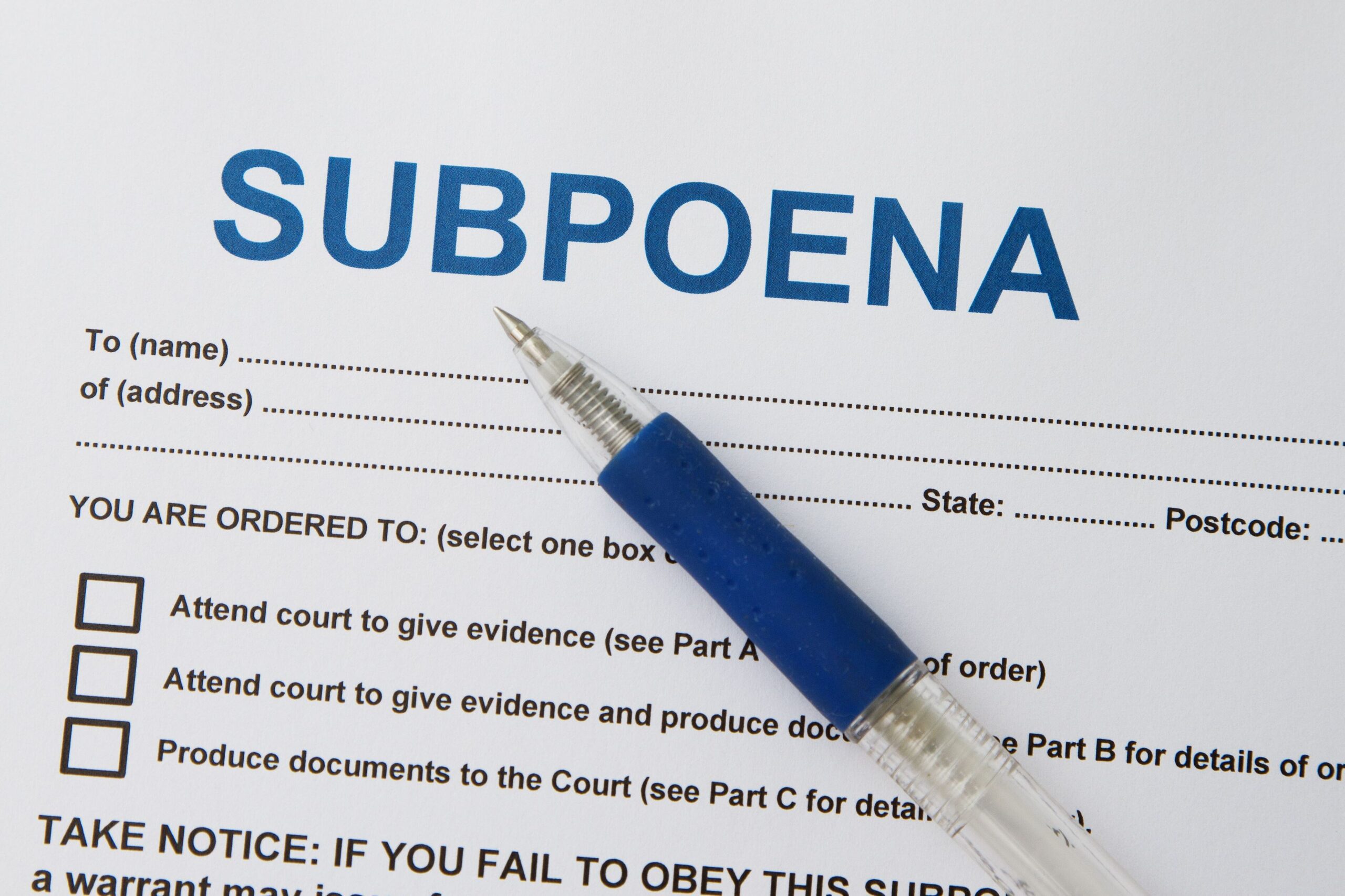 person refusing to comply with a police subpoena scaled
