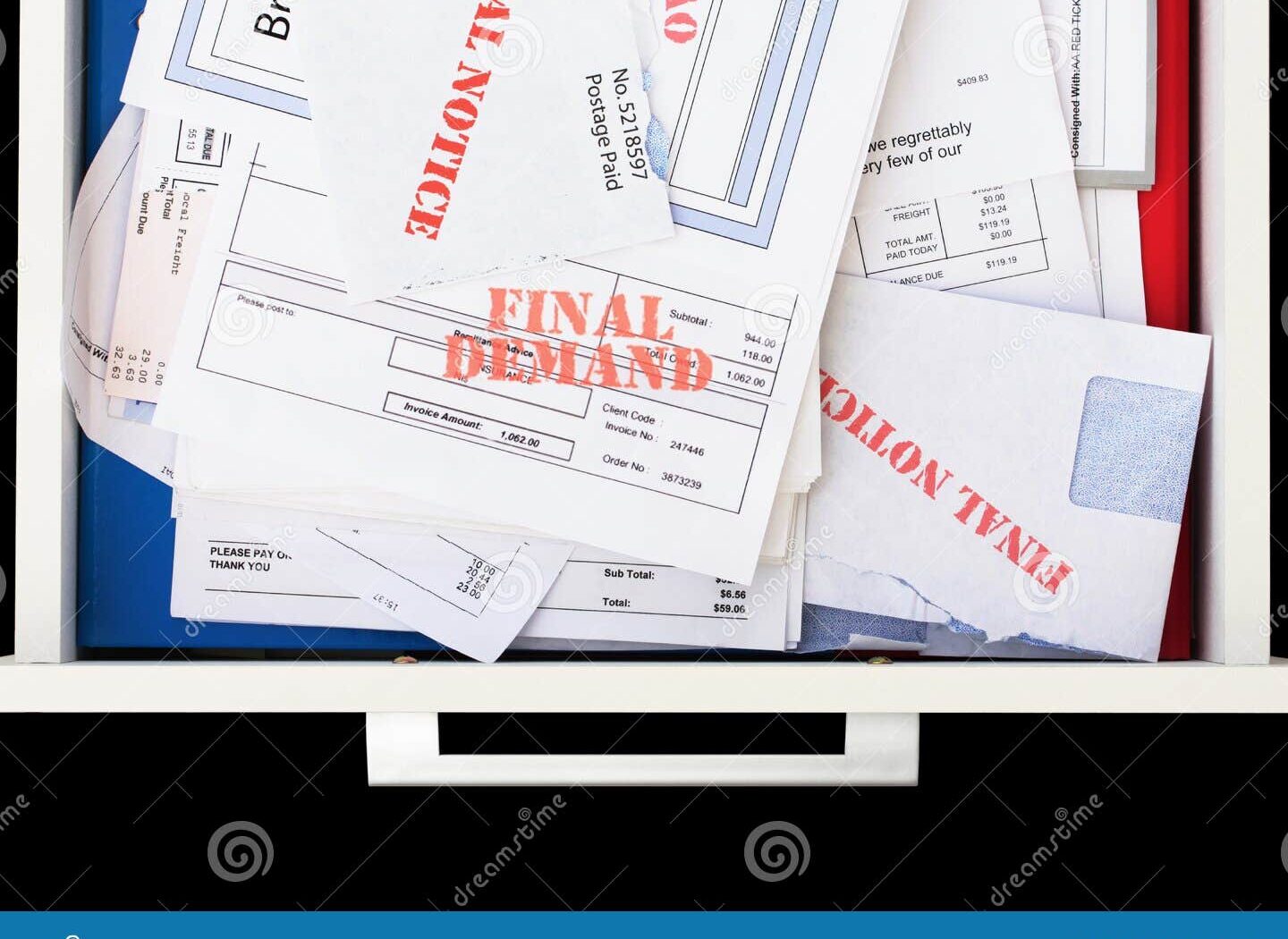 stack of unpaid invoices in accounting